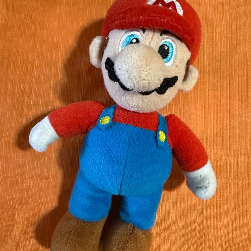 Colorful Plush Toy - Red, Blue, and Brown